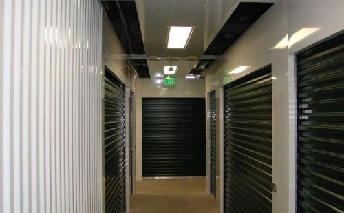Hall-Flush piers - headers - corrugated wall panels - 3 foot partial soffit in ceiling